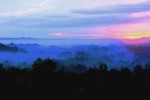 Sunrise from Punthuk Setumbu Hill overlooking Borobudur Temple and Mount Merapi