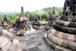 Sunrise from Punthuk Setumbu Hill overlooking Borobudur Temple and Mount Merapi