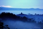 Sunrise from Punthuk Setumbu Hill overlooking Borobudur Temple and Mount Merapi